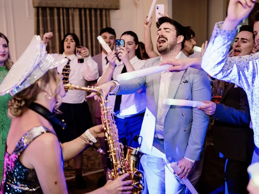 Alice Sax performing at an event