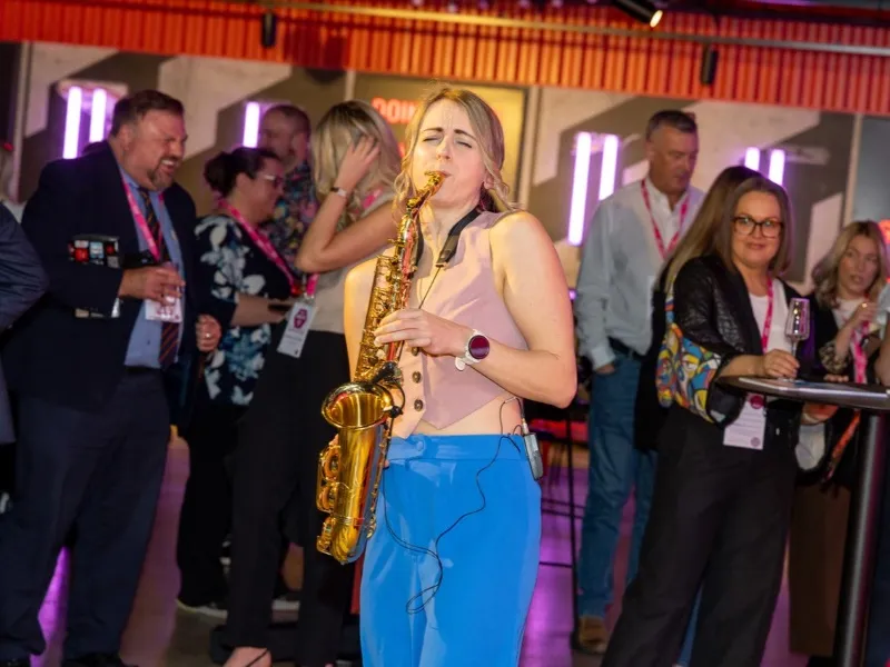 Alice Sax performing at an event