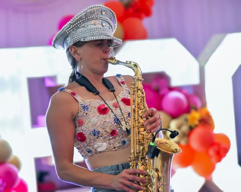 Alice Sax performing at an event
