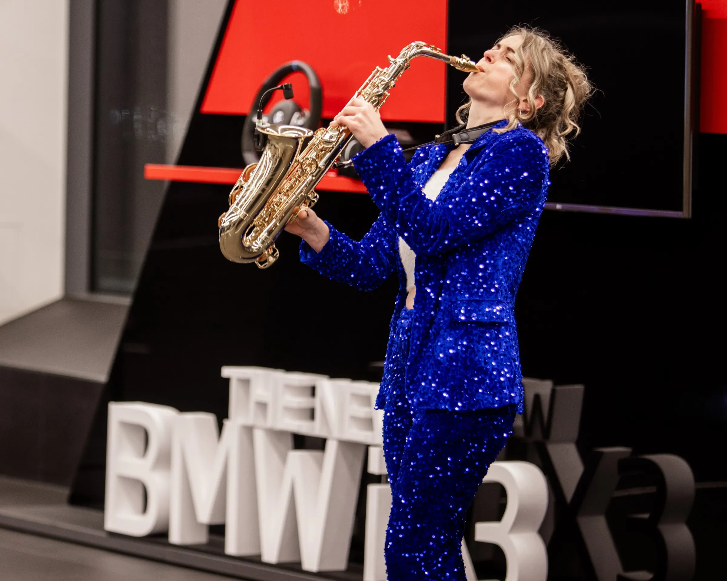 Alice Sax performing at an event