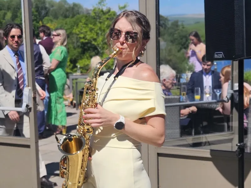 Alice Sax performing at an event