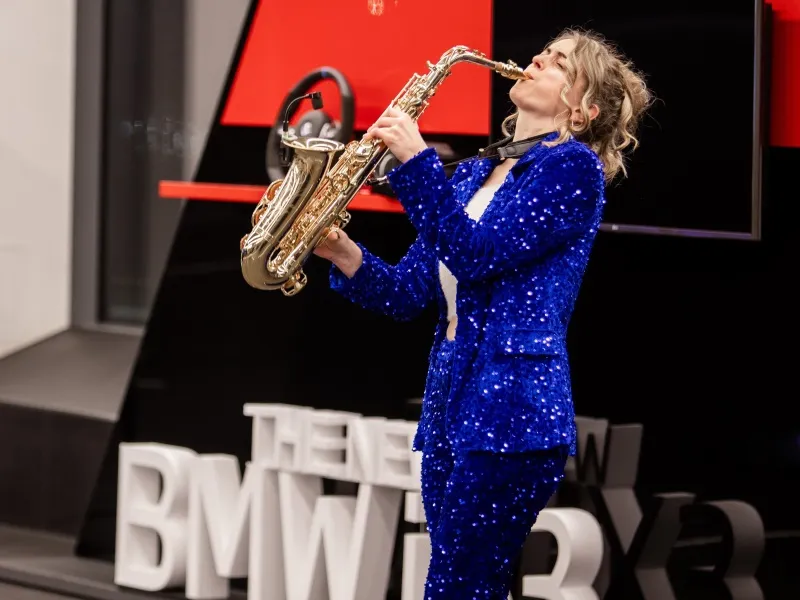 Alice Sax performing at an event