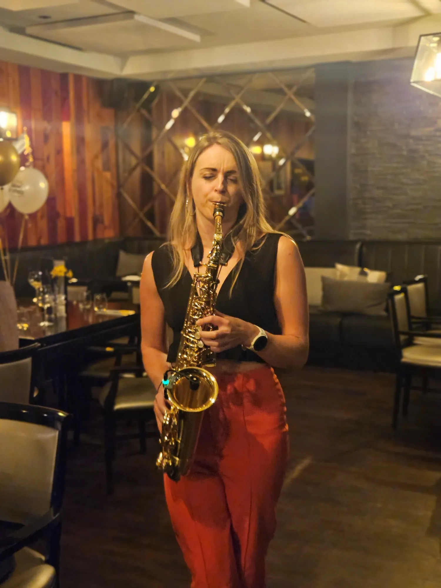 Alice Sax performing at an event