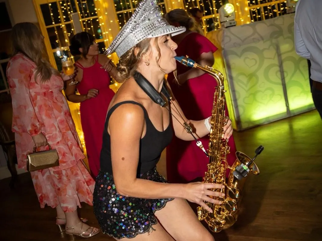 Alice Sax performing at an event