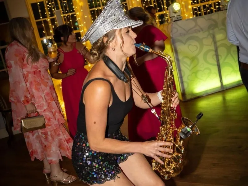 Alice Sax performing at an event