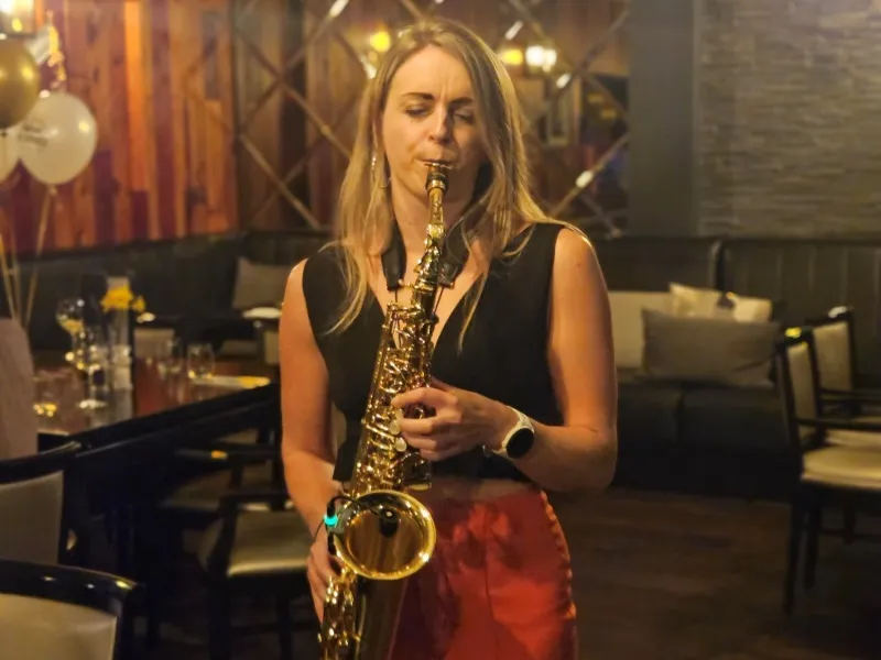 Alice Sax performing at an event