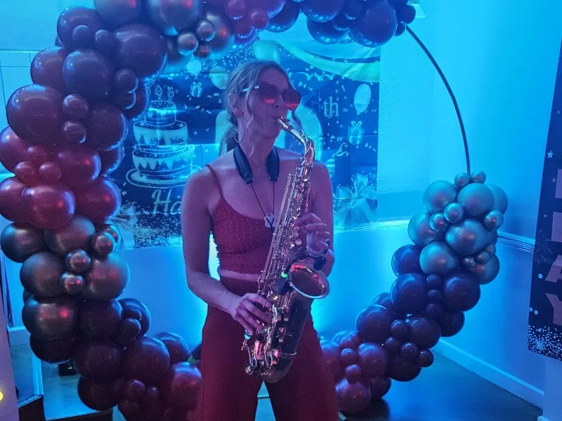 Alice Sax performing at an event