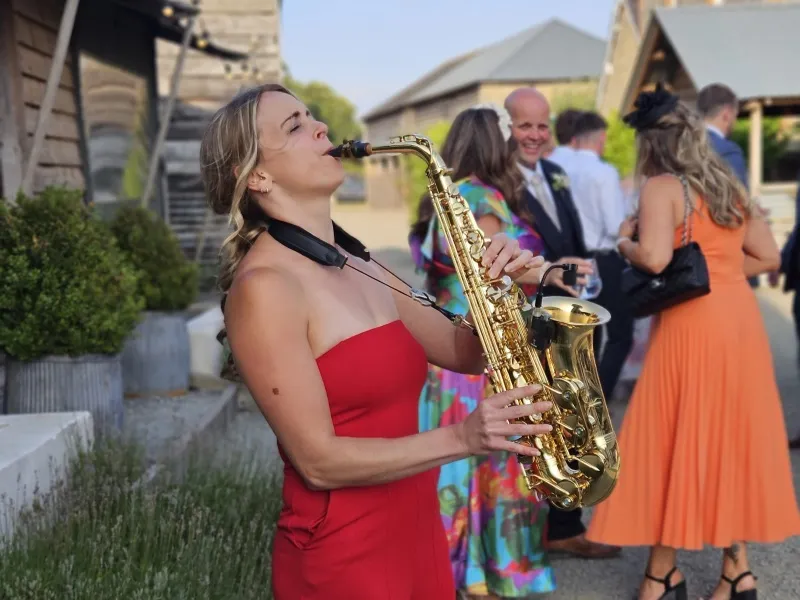 Alice Sax performing at an event
