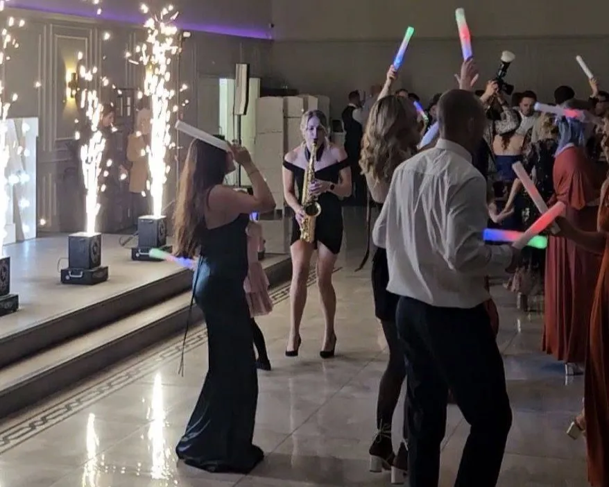 Alice Sax performing at an event