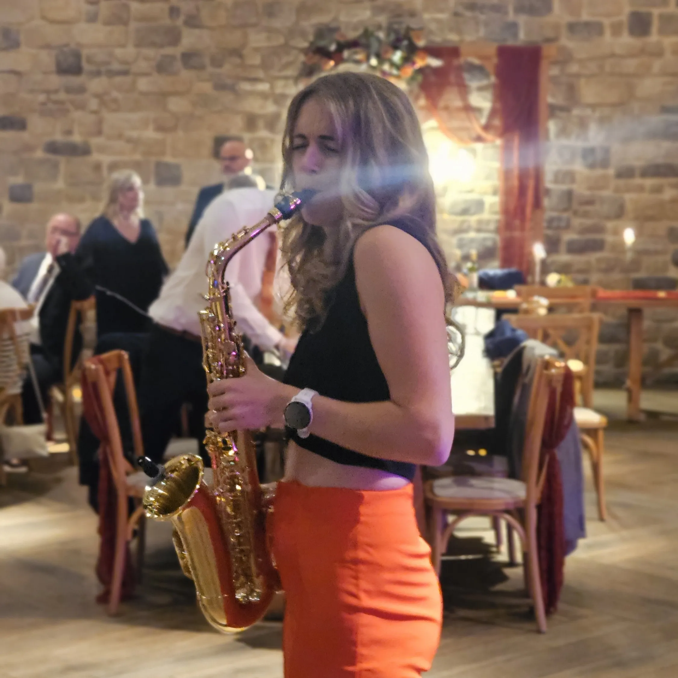 Alice Sax performing at an event