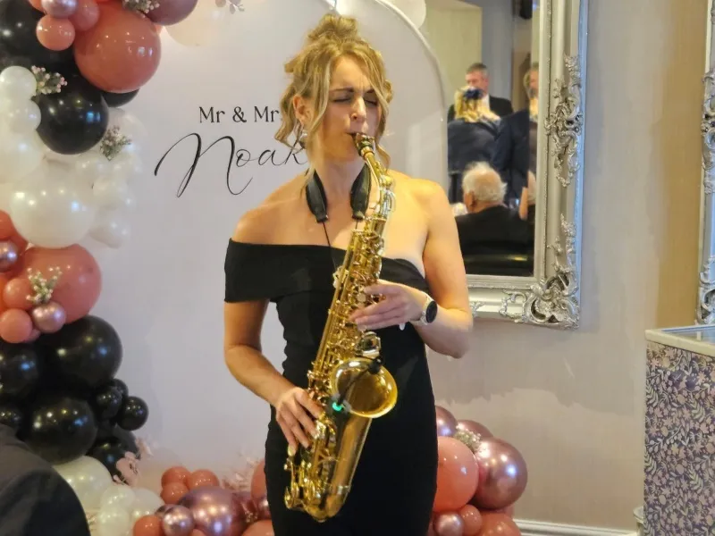 Alice Sax performing at an event